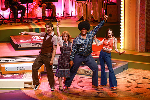 Photo of the cast of 8-track posing at the end of the song Brick House by the Commodores.