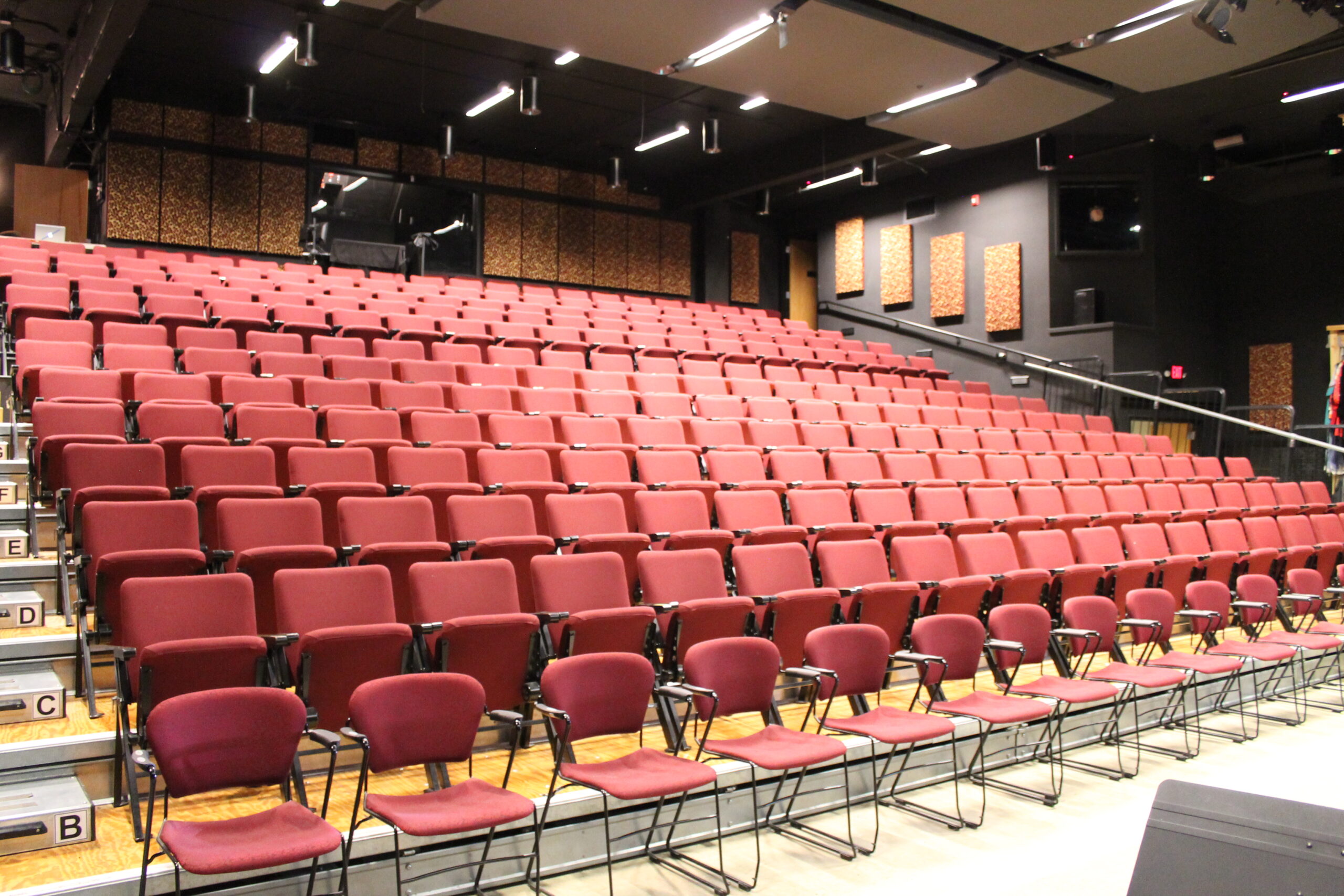 Picture of the removable/wheelchair-accessible front row of seats in the New Stage Theatre Picture of the removable/wheelchair-accessible front row of seats in the New Stage Theatre