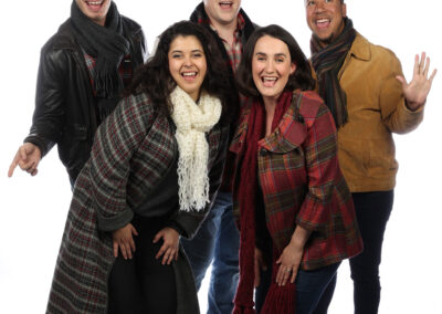 Richie Stone, Tara Velarde, William Shindler, Cara Arcuni, and Michael Hammerstrom in "A Very Merry PDX-mas" at Broadway Rose Theatre Company, November 23 – December 22, 2022. Photo by Craig Mitchelldyer.