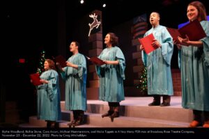 Blythe Woodland, Richie Stone, Cara Arcuni, Michael Hammerstrom, and Malia Tippets in A Very Merry PDX-mas at Broadway Rose Theatre Company, November 23 - December 22, 2022. Photo by Craig Mitchelldyer.