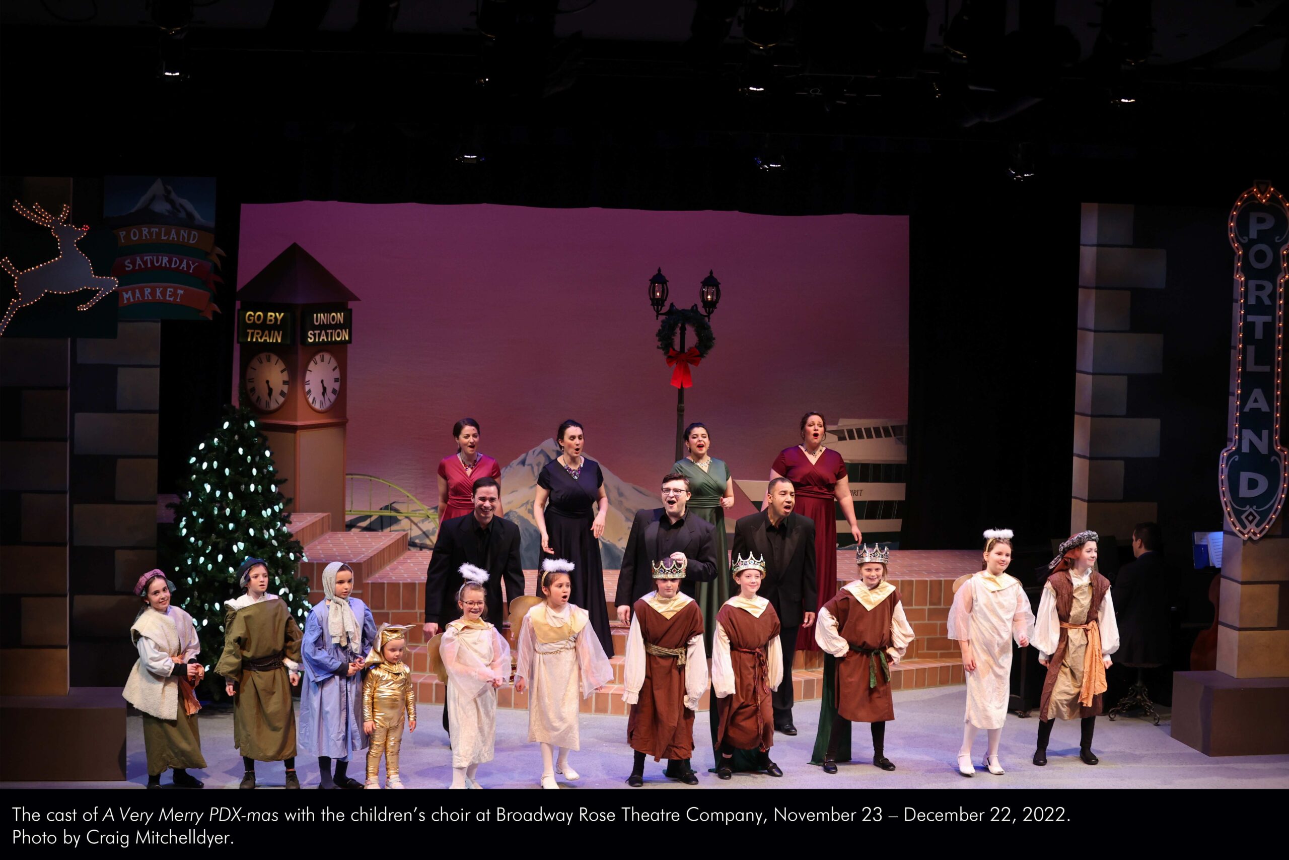 The cast of A Very Merry PDX-mas at Broadway Rose Theatre Company, November 23 - December 22, 2022. Photo by Craig Mitchelldyer.