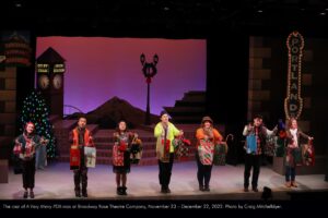 The cast of A Very Merry PDX-mas at Broadway Rose Theatre Company, November 23 - December 22, 2022. Photo by Craig Mitchelldyer.