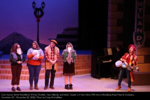 Cara Arcuni, Blythe Woodland, William Shindler, Tara Velarde, and Malia Tippets in A Very Merry PDX-mas at Broadway Rose Theatre Company, November 23 - December 22, 2022. Photo by Craig Mitchelldyer.