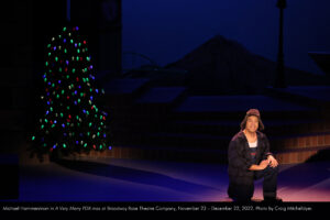 Michael Hammerstrom in A Very Merry PDX-mas at Broadway Rose Theatre Company, November 23 - December 22, 2022. Photo by Craig Mitchelldyer.
