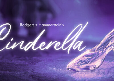 Rodgers + Hammerstein's Cinderella logo, featuring a lavender-tinted photo of a glass slipper shining under a spotlight.
