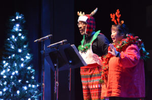 Broadway Rose guild members take the stage for a song.