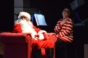 Pianist Darcy White being thanked for her wonderful playing.