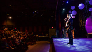 What to find at the gala: Joe Theissen performing on stage for the musical revue.