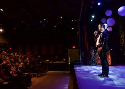 What to find at the gala: Joe Theissen performing on stage for the musical revue.