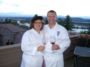 Lisa and Ed toasting at a Director's Dinner.