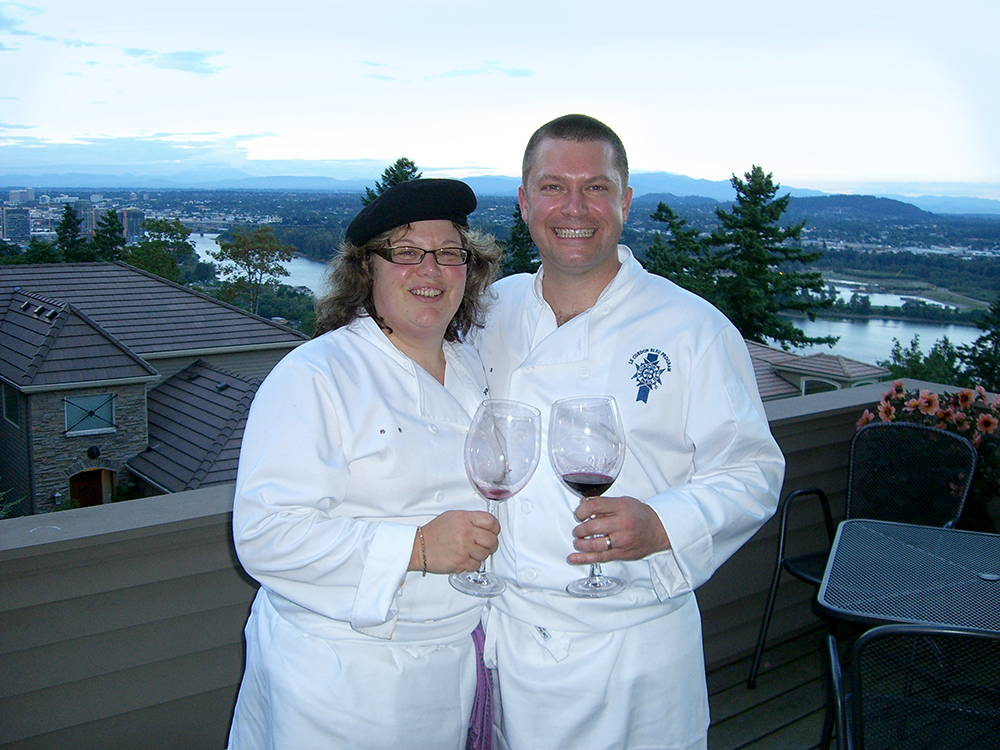 Lisa and Ed toasting at a Director's Dinner.