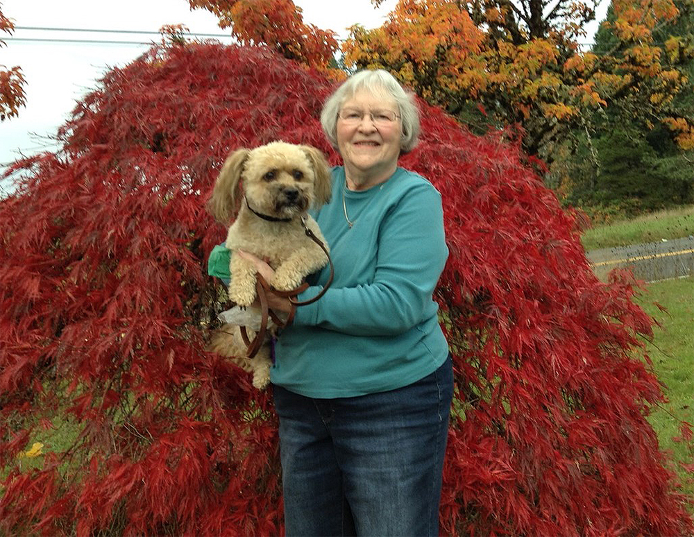 Juanita and Cooper Juanita and her dog, Cooper.