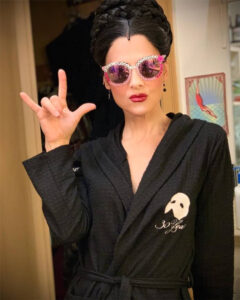 Kelly rocking out in the dressing room