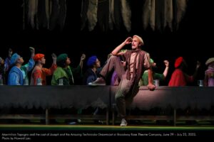 Maximilian Tapogna and the cast of Joseph and the Amazing Technicolor Dreamcoat at Broadway Rose Theatre Company, June 29 - July 23, 2023. Photo by Howard Lao.