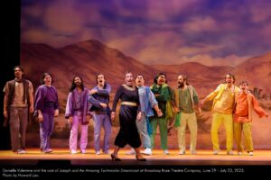 Danielle Valentine and the cast of Joseph and the Amazing Technicolor Dreamcoat at Broadway Rose Theatre Company, June 29 - July 23, 2023. Photo by Howard Lao.