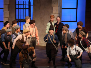 Production photo from Newsies - 2022.