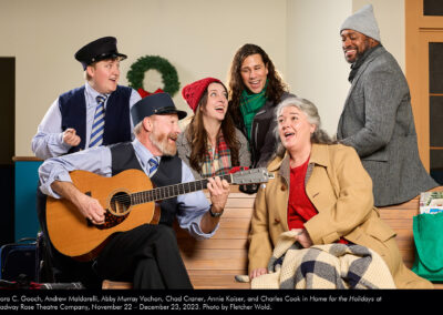 Aurora C. Gooch, Andrew Maldarelli, Abby Murray Vachon, Chad Craner, Annie Kaiser, and Charles Cook in "Home for the Holidays" at Broadway Rose Theatre Company, November 22 - December 23, 2023. Photo by Fletcher Wold.