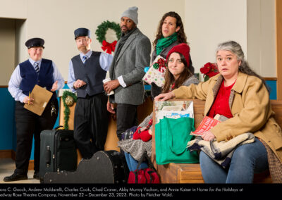 Aurora C. Gooch, Andrew Maldarelli, Charles Cook, Chad Craner, Abby Murray Vachon, and Annie Kaiser in "Home for the Holidays" at Broadway Rose Theatre Company, November 22 - December 23, 2023. Photo by Fletcher Wold.