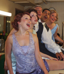 Meredith goofing around backstage with some fellow cast members.