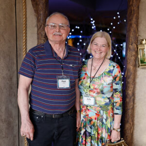 Photo of Paul and Judy Miller entering the 2023 Broadway Rose gala.