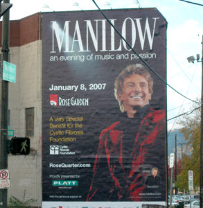 Photo of the banner for Barry Manilow's show at the Rose Garden in 2007, sponsored by Platt Electric.