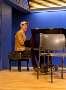 Photo of Santino Fontana performing for Broadway Rose patrons at the Opera Center of America in a special question and answer session with the Broadway star.