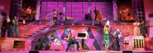 Photo from Beautiful, showing the whole stage with ensemble cast dancing to the song 1650 Broadway. Photo by Liz Wade.