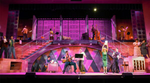 Photo from Beautiful, showing the whole stage with ensemble cast dancing to the song 1650 Broadway. Photo by Liz Wade.