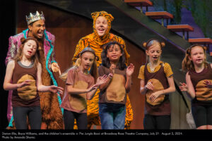 Darion Elie, Bryce Williams, and the children’s ensemble in The Jungle Book at Broadway Rose Theatre Company, July 31 – August 3, 2024. Photo by Amanda Shama.