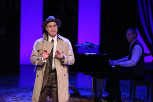 Photo of Barney Stein in our 2018 production of Murder for Two.