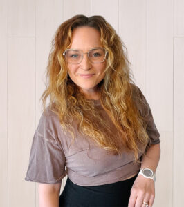 Photo of Sara Catherine Holder smiling for the camera.