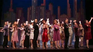 Photo of the performers bowing at the end of our 2015 production of Thoroughly Modern Millie.