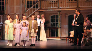 Photo from The Sound of Music, 2012, wherein the von Trapp kids are singing their goodnight song to the party guests.