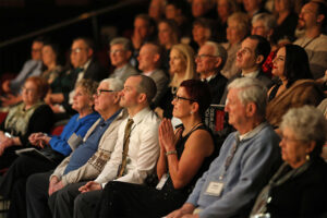 Photo of the audience at our 2024 Gala watching the musical revue.