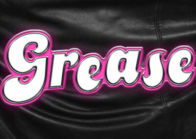 Logo graphic for Grease. The word Grease is in embossed lettering with a pink outline, looks a bit like a shiny car make and model decal. This is overlaid onto an image of the back of a shiny black leather jacket.