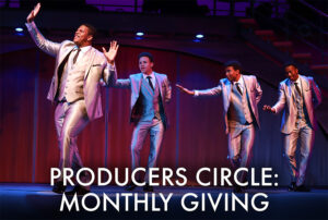 Photo from our production of Beautiful showing the group the Drifters singing together in shining silver suits. Superimposed over the image are the words Producers Circle Monthly Giving.