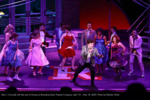 Alec J. Connolly with the cast of Grease at Broadway Rose Theatre Company, April 10 – May 18, 2025. Photo by Fletcher Wold.