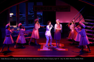 Teddy Sferrazza and Brit Eagan with the cast of Grease at Broadway Rose Theatre Company, April 10 – May 18, 2025. Photo by Fletcher Wold.