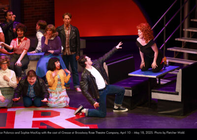 Victor Polanco and Sophie MacKay with the cast of Grease at Broadway Rose Theatre Company, April 10 – May 18, 2025. Photo by Fletcher Wold.