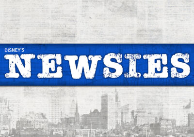 Logo for Newsies. The text is in an old newsprint font surrounded by a bright blue box. Behind that, in the background, it an old photograph of the New York skyline from the early 20th century.