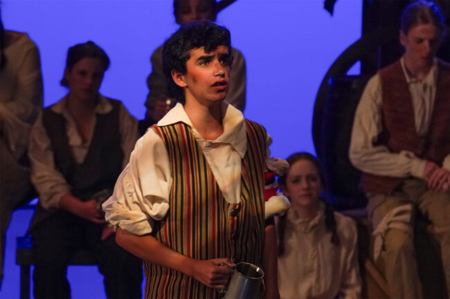 A photo of Francesco as Grantaire in Les Miserables Student Edition, 2025.