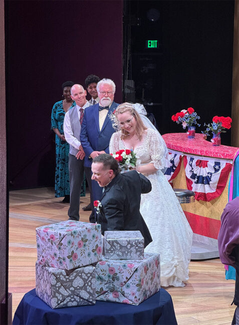 Photo from the stage left wing looking on stage during a performance of Waitress, offering a unique perspective of a production from backstage.