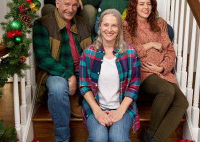 Ali Bell, Mike Dederian, Anna Prosser, Joe Theissen, Jomar Ferreras, and Blythe Woodland in Christmas in Door County at Broadway Rose Theatre Company, November 26 - December 21, 2025. Photo by Fletcher Wold.