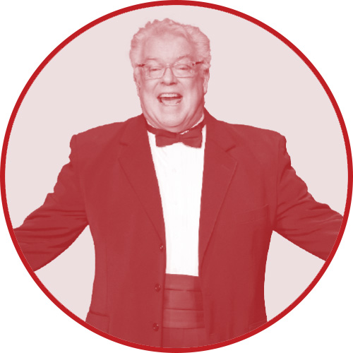 Photo of Dan Murphy in a tuxedo.