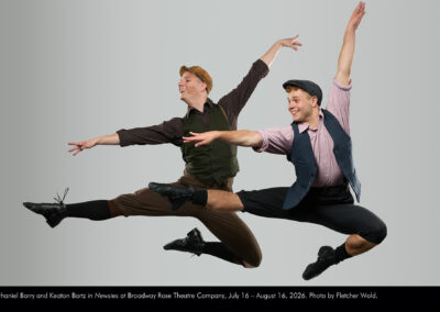Nathaniel Barry and Keaton Bartz in Newsies at Broadway Rose Theatre Company, July 16 - August 16, 2026. Photo by Fletcher Wold.